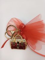 🎓 Portachiavi Borsetta Laurea Cherry and Peach – Eleganza e Brillantezza - immagine 2